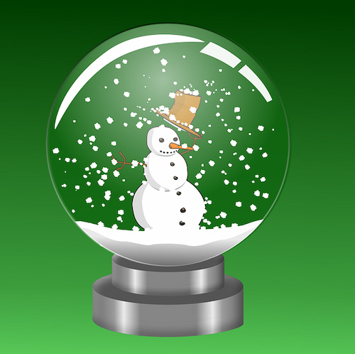 A snow man in a snow globe