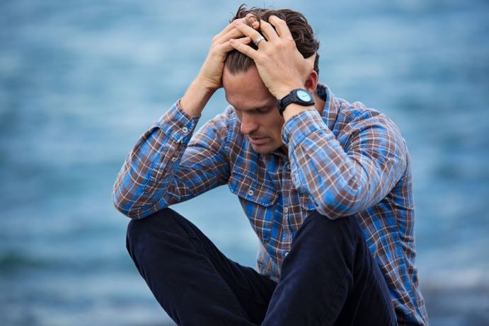 Man depressed and anxious feels he is a failure
